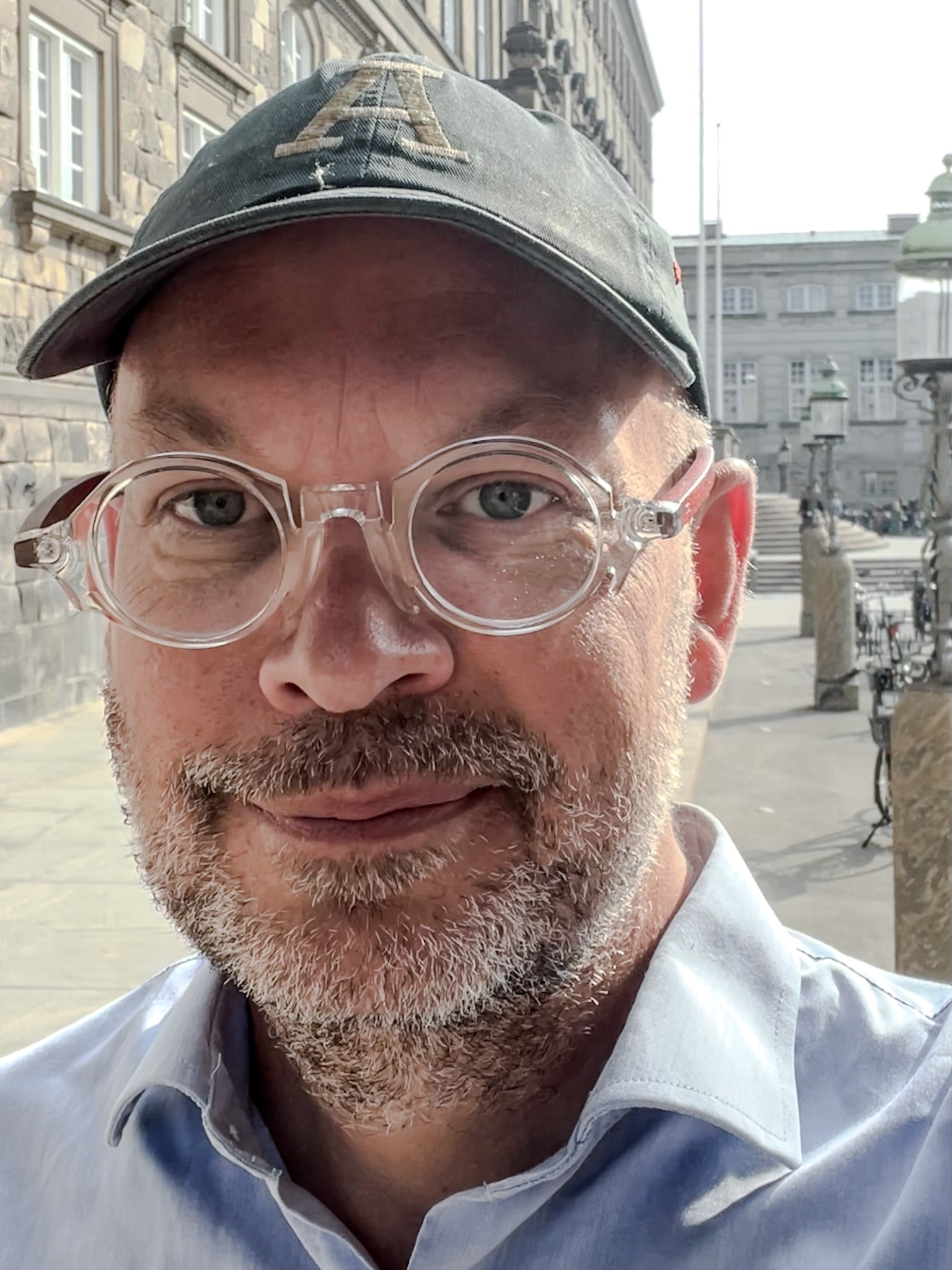 Mads Hjorth smiling on a spring day in Copenhagen